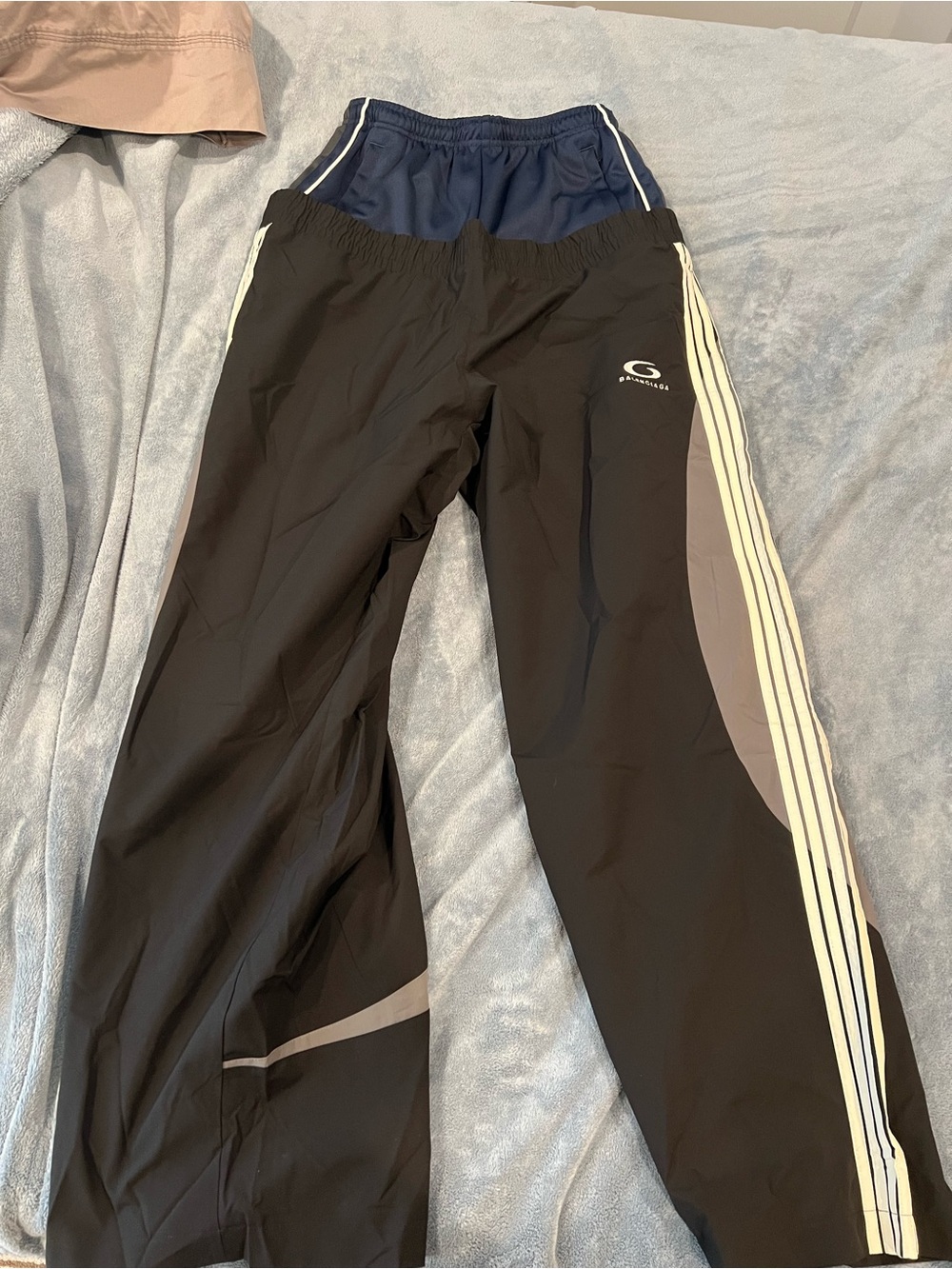 BALENCIAGA DOUBLE WAISTBAND TRACKSUIT PANTS
Black XS